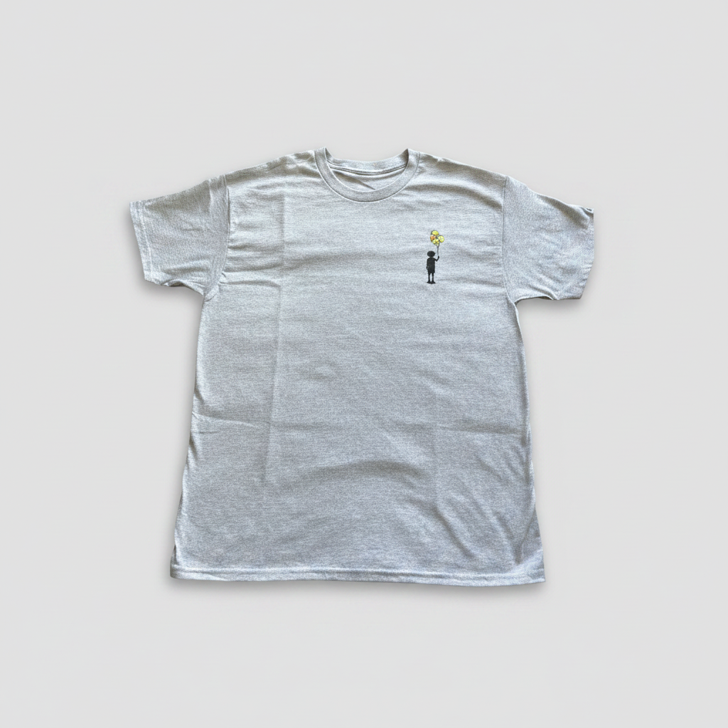 Gray t-shirt with a small graphic on a white background